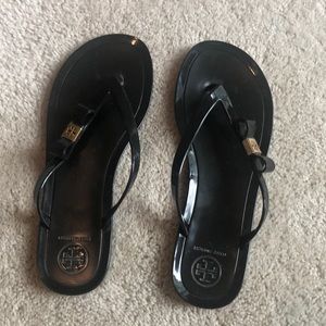 Tory Burch Black Flip Flops with Gold Bow Detail